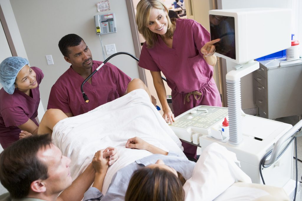 A doctor retrieving eggs during an in vitro fertilization (IVF) procedure